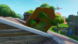 Fortnite : Défi semaine 2, saison 9 : Visiter un énorme téléphone, un grand piano et un trophée de pêche géant