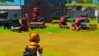 Porter un ours en peluche rose géant trouvé à Risky Reels sur 100m, Mission Midas, semaine 9