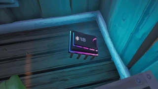 Fortnite : Défi Décryptage, puce 18 : Chercher quelque part entre Mega Mall et Dusty Divot