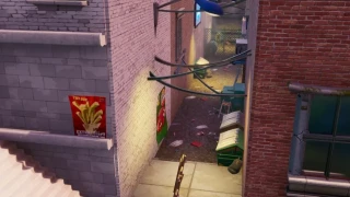 Fortnite : Défi Virée urbaine : Trouver Jonesy caché derrière une clôture