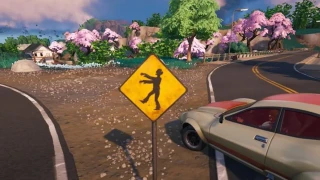 Participer à la destruction de panneaux routiers Attention zombies, défi Cauchemars 2023